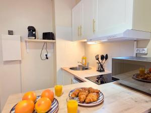 Appartements Le Boston, Chic, Lit Queen Size, Pres du Centre : photos des chambres