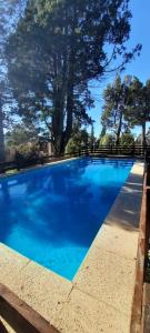 Cabaña con piscina climatizada y vista al lago