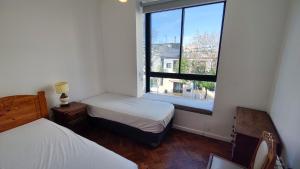 "Paraiso en la Ciudad" con terraza y parrilla