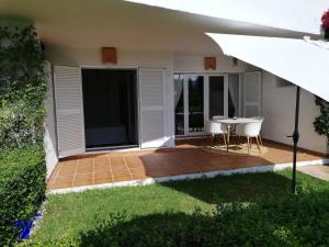 Ground floor apt with terrace in front of the pool