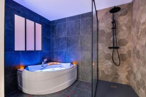 Appartements Beige Hospitalite - Ruby - Love Room - Netflix : photos des chambres