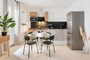 Appartements Beige Hospitalite - Melisse Elegance et Securite au Coeur de Saint-Etienne : photos des chambres