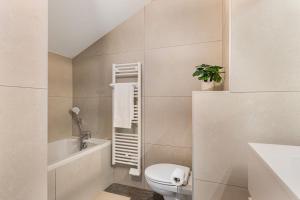 Appartements Beige Hospitalite - Sienna 4br- Elegance et Confort gare : photos des chambres