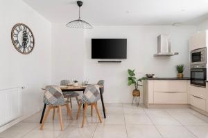 Appartements Beige hospitalite - Capucine - Floral charmant chaleureux wifi Netflix : photos des chambres