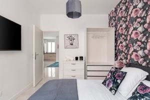 Appartements Beige hospitalite - Capucine - Floral charmant chaleureux wifi Netflix : photos des chambres