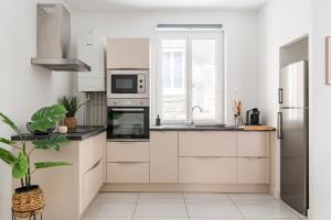 Appartements Beige hospitalite - Capucine - Floral charmant chaleureux wifi Netflix : photos des chambres