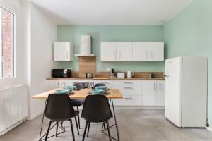 Appartements Beige hospitalite - Frida : photos des chambres