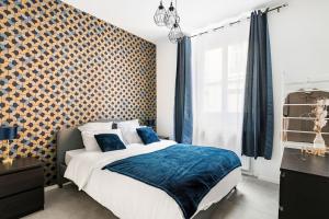 Appartements Beige hospitalite - Frida : photos des chambres