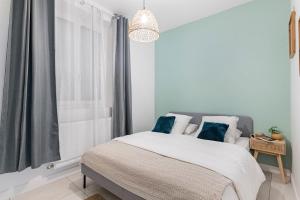 Appartements Beige hospitalite - Frida : photos des chambres