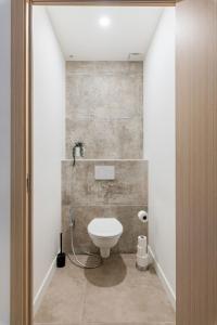 Appartements Beige Hospitalite - Totem Netflix et wifi gratuit : photos des chambres