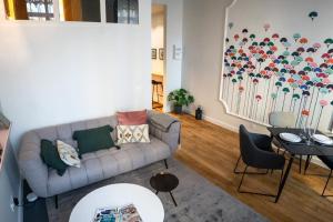 Appartements Beige Hospitalite - Emma - hypercentre - appart- unique-parking : photos des chambres