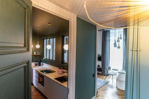 Appartements Beige Hospitalite - Romy - hypercentre - 2 bedrooms - parking : photos des chambres