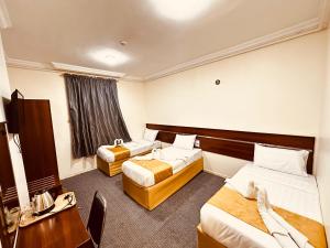 فندق ذاخر بلازا Dhakher Plaza Hotel توصيل مجاني من وإلى الحرم Free shuttle to and from the Haram