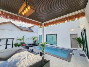 Beloved Bliss Pool Villa Bangsaen พูลวิลล่าบางแสนมีสไลด์เดอร์