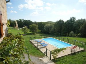 Maisons de vacances Holiday Home in Rueyres with Private Pool : photos des chambres