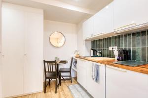 Appartements Studio cosy RER C direct Paris et Tour Eiffel : photos des chambres