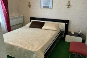 Maisons de vacances Cozy duplex with garden on the outskirts of Paris : photos des chambres