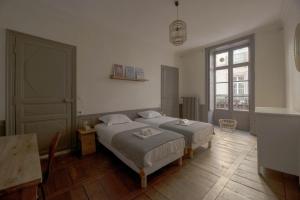 Appartements L-Historique : photos des chambres