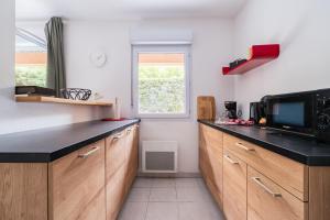 Appartements Le Moulin de la Flambere - Proche Aeroport : photos des chambres