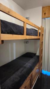 Appartements Immeuble Val Benoit coeur station 4 couchages face a la piste de l-aiguille : photos des chambres