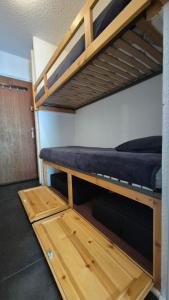 Appartements Immeuble Val Benoit coeur station 4 couchages face a la piste de l-aiguille : photos des chambres