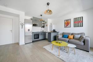 Appartements Le 197 - Balcon - Proche Paris & Stade de France : photos des chambres