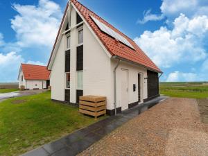 Modern holiday home by the sea with sauna