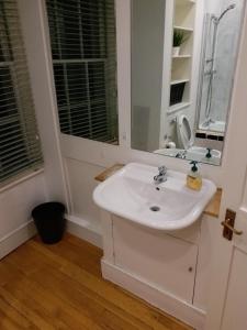 Private rooms with shared bathrooms and a top floor studio