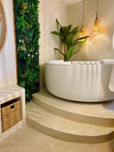 Appartements Suite Myria, Balneo & Cinema - 1 heure de Paris : photos des chambres