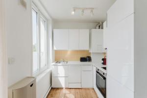 Appartements 2-bedroom apartment near metro : photos des chambres