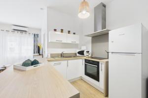 Appartements Le Thieblemont - Elegance and Private Outdoor Space : photos des chambres