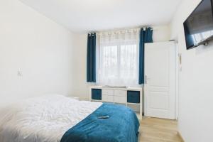 Appartements Le Thieblemont - Elegance and Private Outdoor Space : photos des chambres