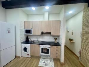 EL RINCÓN DEL MARQUÉS ÁTICO con aire acondicionado junto a Laurel
