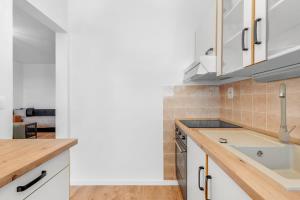 City Glow Apartment with Balcony