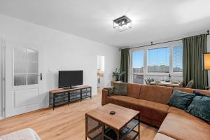 City Glow Apartment with Balcony