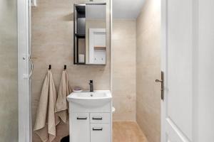 City Glow Apartment with Balcony