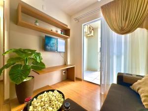 Apto completo com VISTA MAR em CONDOMINIO RESORT FRENTE MAR em Barra Velha 2 quartos AR CONDICIONADO CHURRASQUEIRA privativa Cozinha Completa PISCINA vaga de Garagem - VIL3