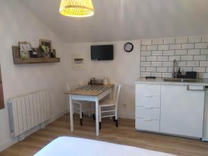 Appartements maison garroenea : photos des chambres
