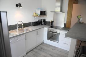 Appartements maison garroenea : photos des chambres