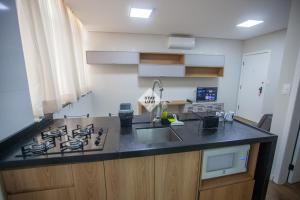 Lindo Studio no coração da Savassi para 4 pessoas