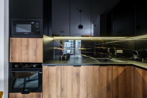 Premium Apartment near Manufaktura 2 Bathrooms & Underground Parking