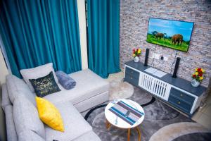 Gany Paradise Getaway- Comfy 1-bedroom apartment next to a Shopping Mall