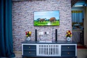 Gany Paradise Getaway- Comfy 1-bedroom apartment next to a Shopping Mall