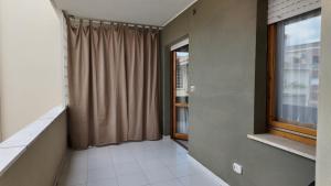 Three-Bedroom Apartment with Balcony