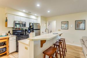 Condo with Golf Course Views Less Than 1 Mi to Sunset Beach!