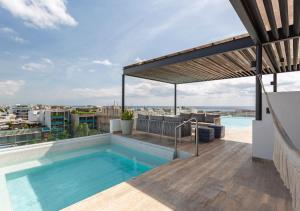 Cozy Studio with Rooftop Pool in Downtown Playa