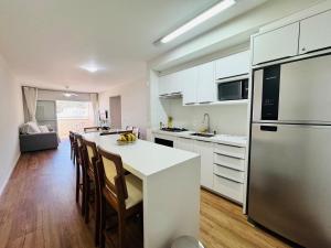 Residencial Larissa - Apartamento na Praia de Palmas - 2 Dormitórios até 6 pessoas