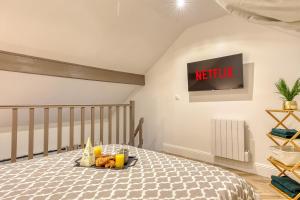 Appartements Chaleureux duplex 30 min de Paris : photos des chambres