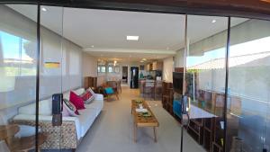 Vista para o mar, Praia e Piscina no Condomínio Búzios Resort Pé na Areia