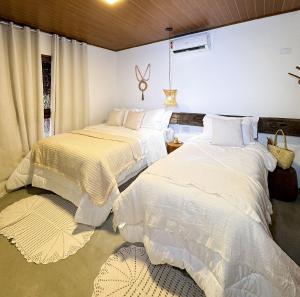 Casa pé-na-areia c piscina e serviço incluído em Japaratinga